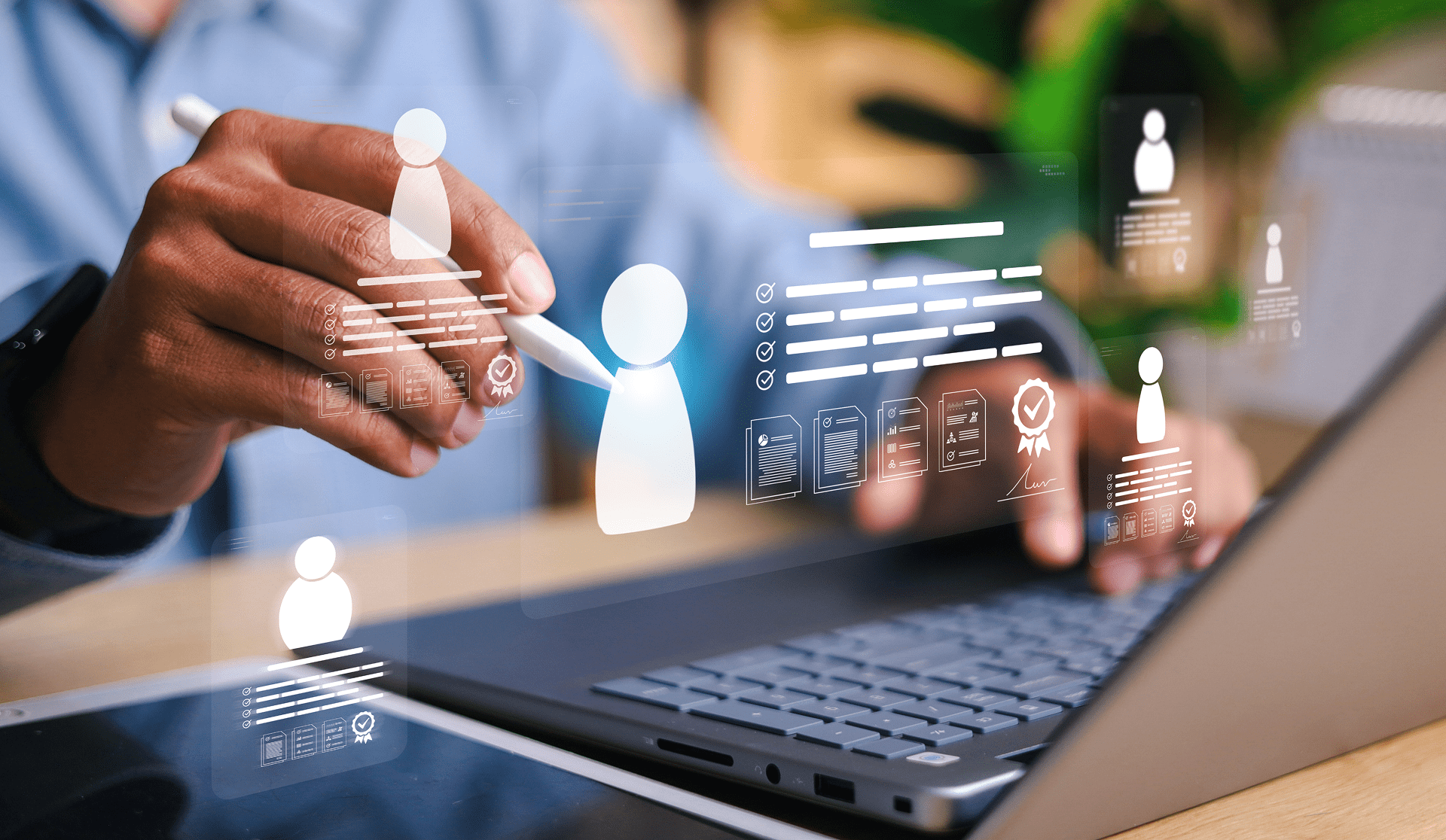 Person interacting with digital interface on laptop.